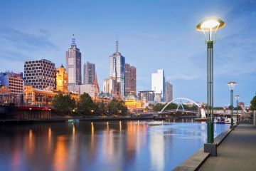 Engineering PhDs will be able to study in Melbourne (pictured) and Birmingham as part of a new £2 million scheme Melbourne skyline, Australia