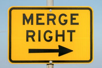 A merge right sign, symbolising mergers