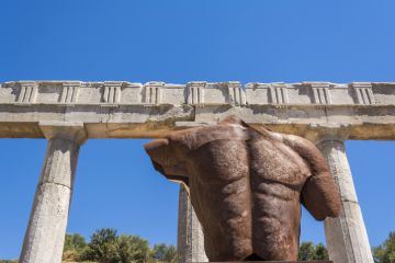 Metallic headless statue in the ancient Greek city of Messinia Metallic headless statue in the ancient Greek city of Messinia