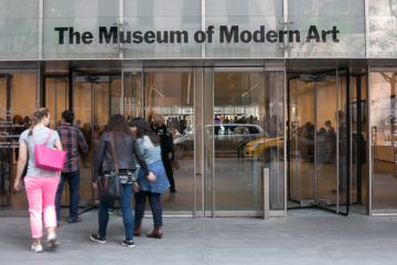 Group of women enters Museum of Modern Art in New York
