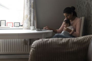Mother working with baby Mother working with baby