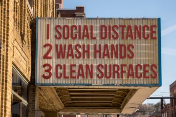 Movie cinema billboard with three basic rules to avoid the coronavirus