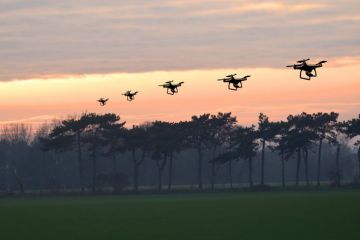 Multiple exposure of a drone flying at sunset