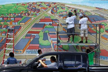 ‘Bird’s Eye View of Allston Village’ is a mural in Cambridge, Mass ‘Bird’s Eye View of Allston Village’ is on the side of a building in Cambridge, Mass