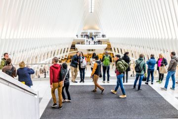 New York City, USA - October 30, 2017 People in The Oculus transportation hub at World Trade Center NYC Subway Station, commute, many crowded crowd hall