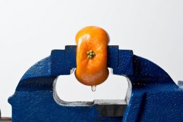 Orange squeezed in vice Orange squeezed in vice