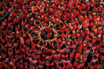 Crowd of people dressed in red