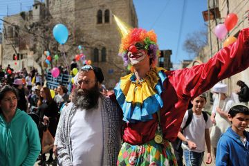 Jewish people celebrate festival of Purim in Hebron, West Bank