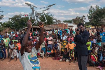 Boy holding drone Boy holding drone