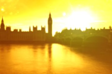 The Houses of Parliament in a dramatic sunset resembling flames
