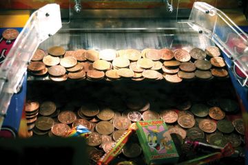 Penny game in amusement arcade Penny game in amusement arcade