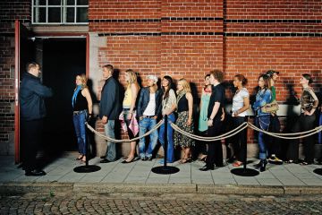People queuing outside nightclub