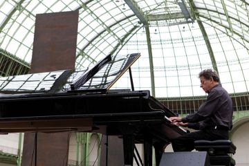 Philip Glass playing the piano