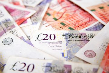 Pile of British currency notes (pounds) Pile of British currency notes (pounds)