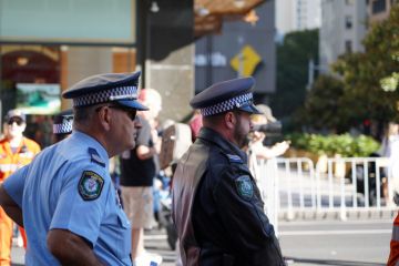 Police watching ANZAC Parade Police watching ANZAC Parade