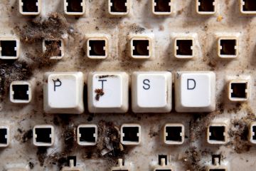 Post-traumatic stress disorder (PTSD) spelled on dirty, broken keyboard keys Post-traumatic stress disorder (PTSD) spelled on dirty, broken keyboard keys