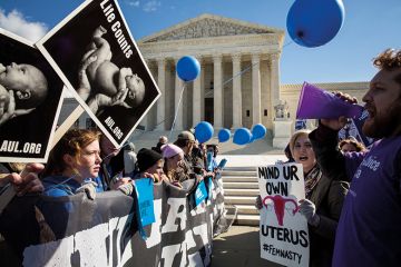 pro choice advocates (right) and anti abortion advocates (left) rally outside of the supreme court pro choice advocates (right) and anti abortion advocates (left) rally outside of the supreme court