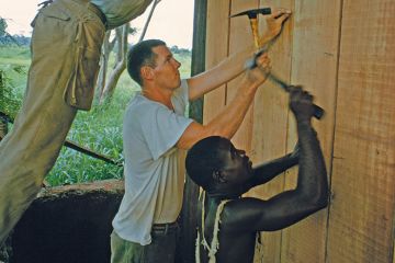Putting up a wooden shack