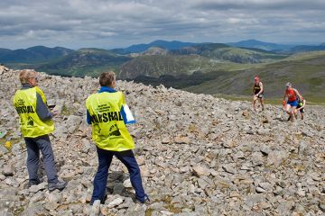 Fell runners arriving at a checkpoint on Kirk Fell, during the Ennerdale Fell Race, Lake District. To illustrate marking a student’s distance travelled, rather than judging them solely on the absolute quality of a final output. Fell runners arriving at a checkpoint on Kirk Fell, during the Ennerdale Fell Race, Lake District. To illustrate marking a student’s distance travelled, rather than judging them solely on the absolute quality of a final output.