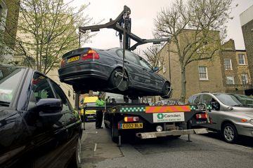 Car removed by a crane Car removed by a crane