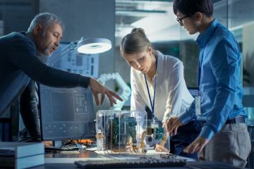 Researchers discuss an experiment