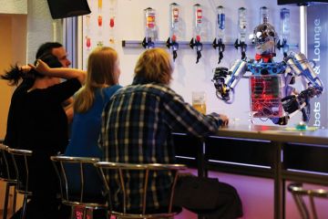 Robot bartender serving customers, Ilmenau, Germany Robot bartender serving customers, Ilmenau, Germany