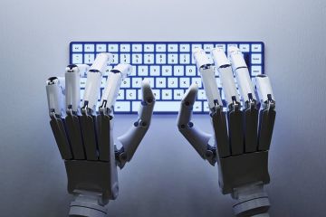 Robot typing on keyboard