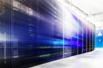 Room with rows of server hardware in the data centre Room with rows of server hardware in the data centre