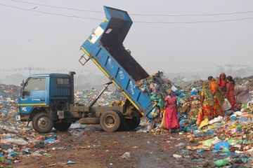 Poor people in a rubbish dump Poor people in a rubbish dump