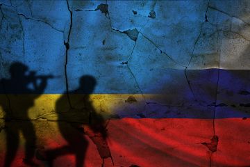 Russian and Ukrainian flags with shadows of soldiers