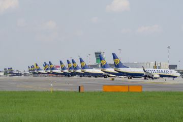 Many identical Ryanair planes lined up, symbolising franchising