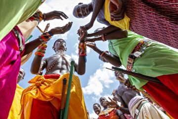 Samburu people in traditional dresses perform local dance in Samburu, Kenya