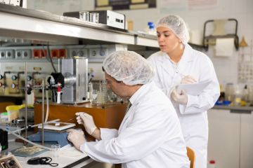 scientists chemists conduct experiments in the laboratory