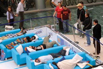 Students sleeping on sofas Students sleeping on sofas