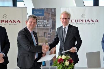 Sir Anton Muscatelli (left), principal of the University of Glasgow, with Sacha Spoun, president of Leuphana University of Lüneburg 