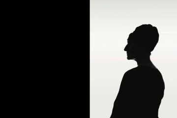 Silhouette of woman looking to the left