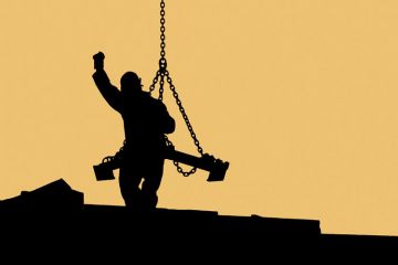 Sillhouette of construction worker handling crane load Sillhouette of construction worker handling crane load