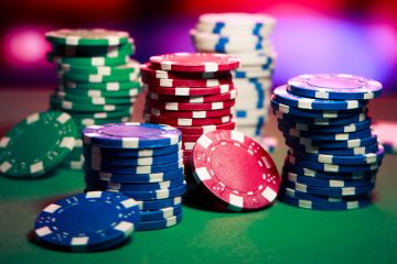 Stacks of casino chips on table Stacks of casino chips on table
