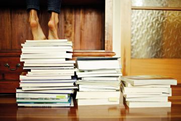 Standing on a pile of books Standing on a pile of books