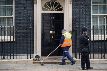 Street cleaner outside Downing Street