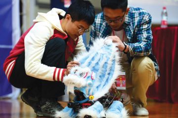 Students demonstrate lion dance robot, RoboGame competition, China