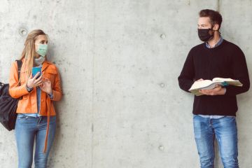 Students social distancing illustrating return-to-campus and government support needs