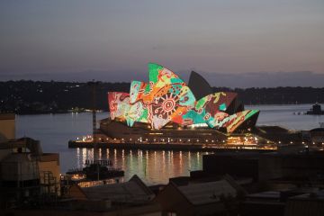 The sails of the Sydney Opera House lit up with an aboriginal design The sails of the Sydney Opera House lit up with an aboriginal design