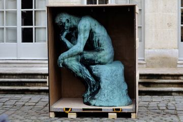 Rodin’s The Thinker statue in a crate. To illustrate that the appointment of a philosopher who refuses to recognise the gender-critical viewpoint as legitimate could have a ‘chilling effect’ on types of studies submitted to the REF.