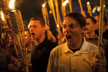 White supremacists march with torches in Charlottesville White supremacists march with torches in Charlottesville