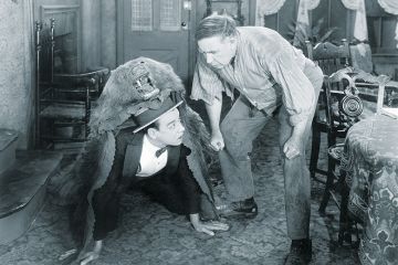 man found under bearskin rug