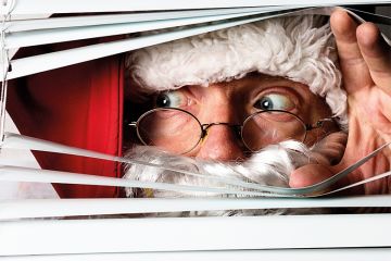 Santa peeping through blinds