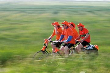 people cycling on tandem bikes in the Netherlands