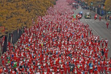 Image of Father Christmas race where people run dressed up as Santa Image of Father Christmas race where people run dressed up as Santa