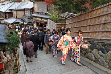 People walking up steps in Kyoto, Japan People walking up steps in Kyoto, Japan